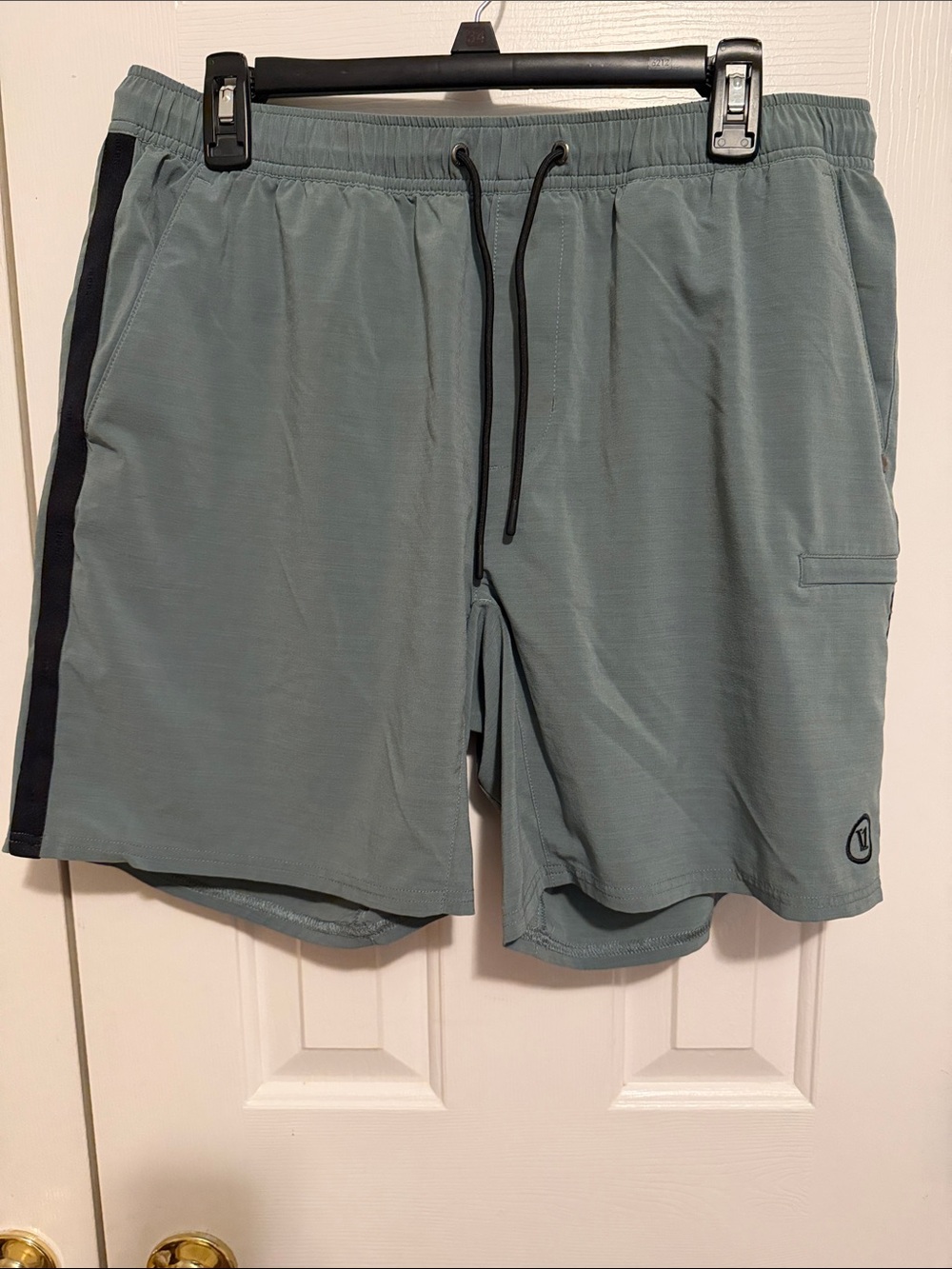 Vuori Seafoam Athletic Shorts with Black Side Stripe